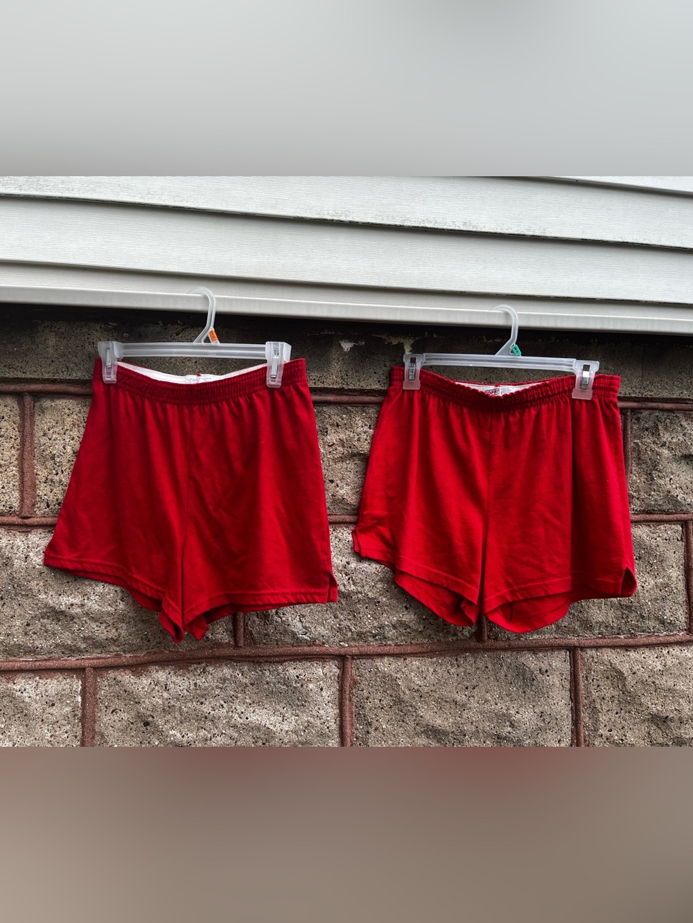 Lot of 2 soffe and Russell athletic junior large elastic waist red shorts